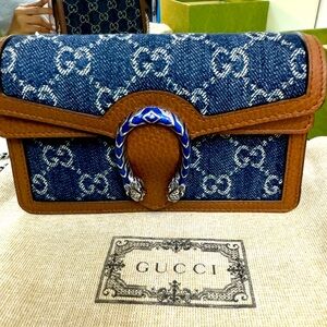 Gucci Super Mini Dionysus
Denim Shoulder Bag